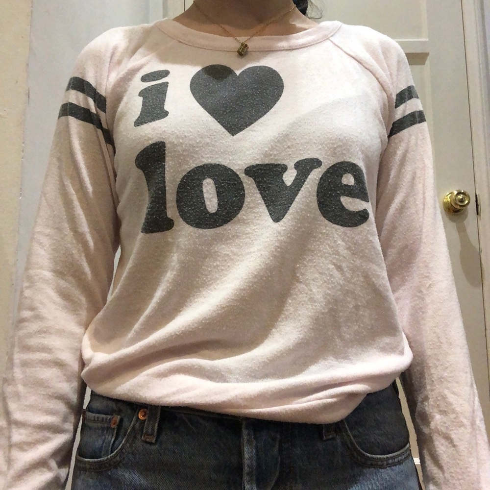 Chaser girl’s pink sweater